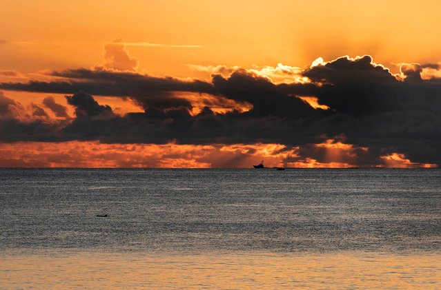 A plume of Saharan dust headed toward the Florida coast is visible during the sunrise at Midtown Beach in Palm Beach on June 27, 2024. (Photo by Meghan McCarthy/Palm Beach Daily News via USA TODAY Network)