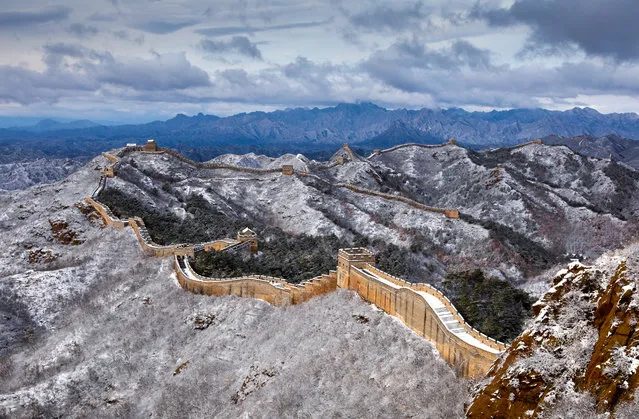 Snow falls at jinshanling Great Wall Scenic Area in Luanping County, Chengde City, North China's Hebei Province, November 19, 2020. (Photo by Costfoto/Barcroft Media via Getty Images)