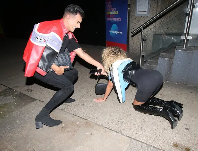 The Only Way Is Essex star Dani Imbert crawled on all floors after falling over while twerking outside a London nightclub on March 26, 2023. The reality star, 24, had been partying with co-star and pal Junaid Ahmed, and her teetering heels seemed to cause her bother as she got low on the streets. (Photo by James Curley/MAGICMOMENTSUK)