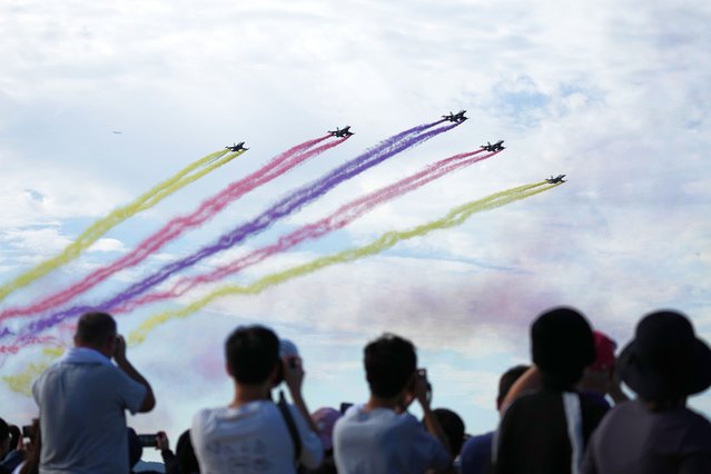 South Korean Air Force's KF-16 fighter jets perform during the Seoul International Aerospace & Defense Exhibition (ADEX) 2025 at the Seoul airport in Seongnam, South Korea, Friday, October 17, 2025. (Photo by Lee Jin-man/AP Photo)