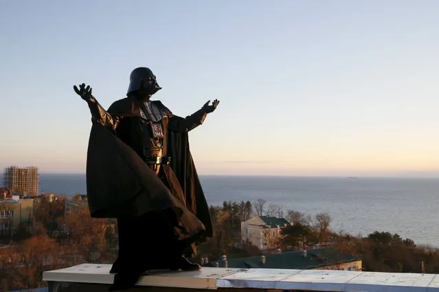 Darth Mykolaiovych Vader, who is dressed as the Star Wars character Darth Vader, poses for a picture as he waits for sunrise on the roof of his apartment block in Odessa, Ukraine, December 4, 2015. (Photo by Valentyn Ogirenko/Reuters)