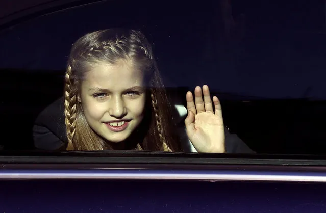 Spain's Princess Leonor waves from her car at the end of a military parade outside Parliament after a ceremony to inaugurate the XII Legislature in Madrid, Spain November 17, 2016. (Photo by Sergio Perez/Reuters)