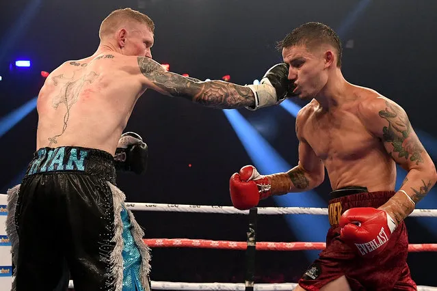 Wade Ryan (L) and Koen Mazoudier in action during their undercard bout during the Steel City Showdown ahead of the super welterweight bout between Australia's Tim Tszyu and Ireland's Dennis Hogan at the Newcastle Entertainment Centre, Newcastle, Australia, 31 March 2021. (Photo by Dan Himbrechts /EPA/EFE)