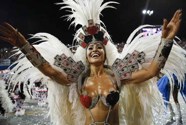 Brazilian model and comedian Sabrina Sato, from the Gavioes da Fiel samba school, performs during a carnival parade in Sao Paulo, Brazil, Sunday, February 15, 2015. (Photo by Andre Penner/AP Photo)