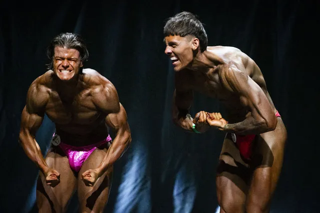 Matthew Jennings and Ellis Morrison perform the “most muscular pose”, also known as the “crab pose”, during the Junior Men's Bodybuilding contest in the Natural Bodybuilding Federation of Ireland's National Championships at The Helix, in Dublin, on Sunday, September 24, 2023. (Photo by Tom Honan/The Irish Times)