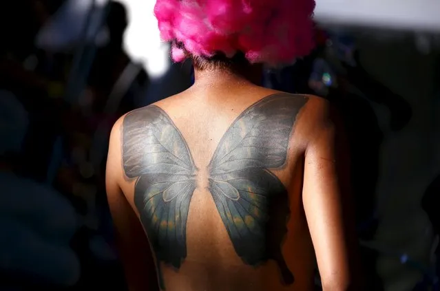 A performer dressed in costume prepares to participate in the Gay and Lesbian Mardi Gras parade in Sydney, Australia, March 5, 2016. (Photo by David Gray/Reuters)