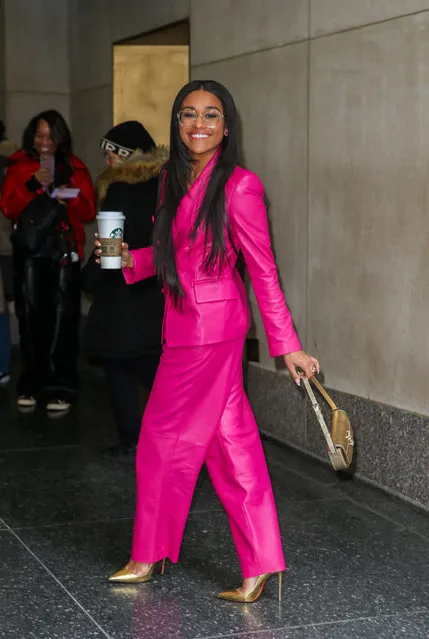 Ariana DeBose is chic in a hot pink suit as she steps out in NYC on February 1, 2024. The actress, 33, paired her head-turning outfit with gold pointed shoes and a matching purse as she stepped out looking stylish on Thursday morning after her appearance on the Today Show. (Photo by Eric Kowalsky/The Mega Agency)