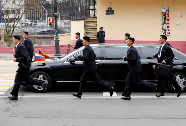 North Korean leader Kim Jong Un is escorted in a car in the Russian far-eastern city of Vladivostok, Russia, April 24, 2019. (Photo by Shamil Zhumatov/Reuters)