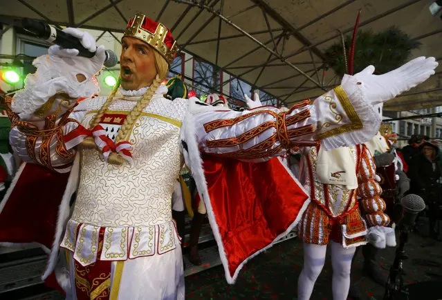 Carnival revellers celebrate during “Weiberfastnacht” (Women's Carnival) in Cologne, Germany February 23, 2017, marking the start of a week of street festivals with the highlight “Rosenmontag”, Rose Monday processions. (Photo by Wolfgang Rattay/Reuters)