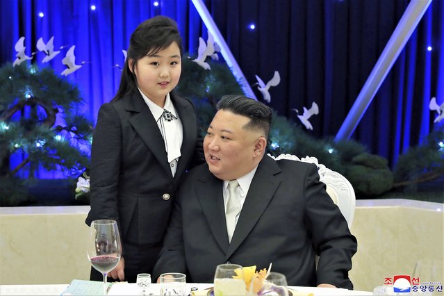 In this photo provided by the North Korean government, North Korean leader Kim Jong Un and his daughter attend a feast to mark the 75th founding anniversary of the Korean People’s Army at an unspecified place in North Korea Tuesday, February 7, 2023. Independent journalists were not given access to cover the event depicted in this image distributed by the North Korean government. The content of this image is as provided and cannot be independently verified. Korean language watermark on image as provided by source reads: “KCNA” which is the abbreviation for Korean Central News Agency. (Photo by Korean Central News Agency/Korea News Service via AP Photo)