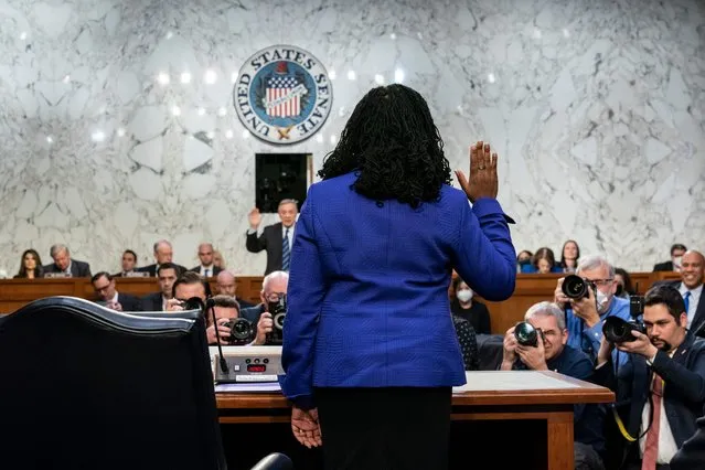 Supreme Court nominee Ketanji Brown Jackson is sworn in by Chairman Dick Durbin (D-IL) at her confirmation hearing before the Senate Judiciary Committee on Capitol Hill in Washington, DC, on March 21, 2022. The US Senate takes up the historic nomination on Monday of Judge Ketanji Brown Jackson to become the first Black woman to sit on the Supreme Court. (Photo by J. Scott Applewhite/Pool via AFP Photo)