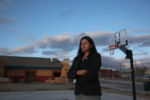 Candida Hunter, Hualapai Tribe councilwoman, poses for a photograph near new buildings on the Hualapai Indian Reservation in Peach Springs, Arizona February 28, 2012. The tiny Hualapai nation, in a bold move that could serve as a test of the limits of the sovereign power of Native American tribes over non-members, exercised its right of eminent domain to take over the management of the site and kick out the non-Indian developer. (Photo by Robert Galbraith/Reuters)