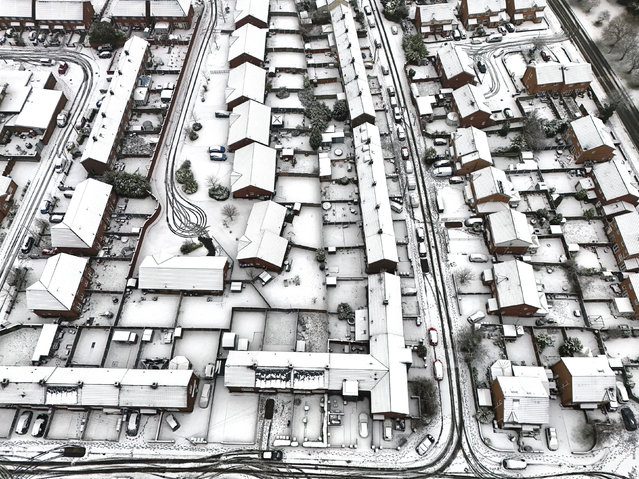 Snow blankets Lee Park in Liverpool, England, Sunday January 5, 2025. (Photo by Peter Byrne/PA Wire via AP Photo)