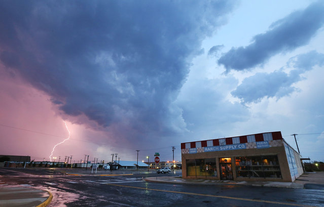 A storm passes through Odessa, Texas, late Thursday, August 21, 2014.  (Photo by Edyta Blaszczyk/AP Photo/Odessa American)