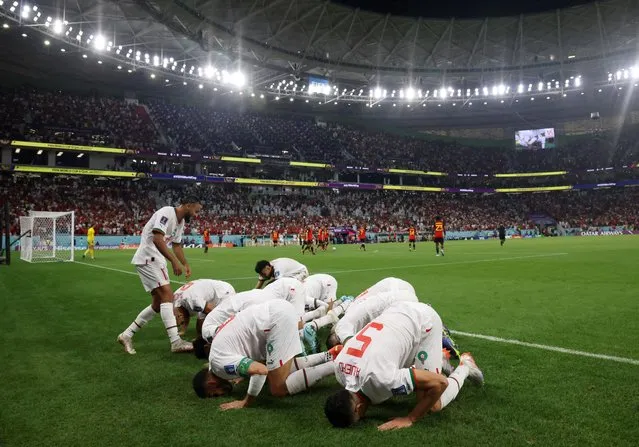 Abdelhamid Sabiri of Morocco celebrates with teammates after scoring their team's first goal during the Group F – FIFA World Cup Qatar 2022 match between Belgium and Morocco at the Al Thumama Stadium on November 27, 2022 in Doha, Qatar. (Photo by Amr Abdallah Dalsh/Reuters)