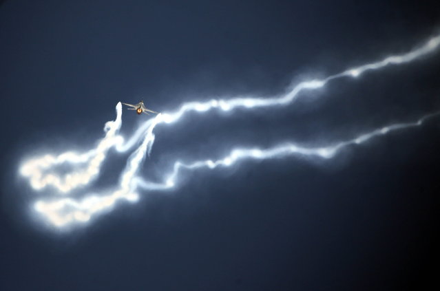 Pakistani Air Force fighter jets perform during the opening ceremony of the ICC Champions Trophy at national stadium in Karachi, Pakistan, 19 February 2025. (Photo by Rehan Khan/EPA)