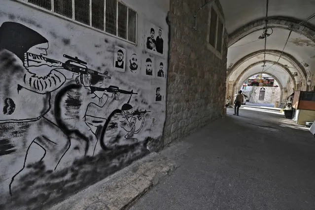 A picture shows the city of Nablus in the occupied West Bank on October 20, 2022 during a general strike by shops in protest of the killing of Palestinian fugitive. A Palestinian on the run after perpetrating a deadly attack against Israeli forces was killed yesterday in the occupied West Bank after he shot at Israelis on the edge of a settlement, officials said. The alleged attacker, identified by Israeli Prime Minister Yair Lapid as Udai Tamimi, had been sought by Israeli security forces since the fatal shooting of an 18-year-old Israeli soldier earlier this month at a checkpoint at the entrance to the Shuafat refugee camp in east Jerusalem. (Photo by Jaafar Ashtiyeh/AFP Photo)