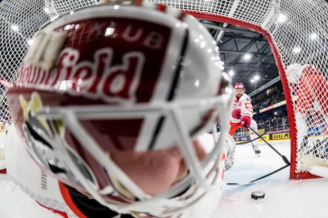 Goaltender Henri Kiviaho of Mountfield HK concedes the opening goal during the Champions Hockey League quarterfinal second leg game between EV Zug and Mountfield Hradec Kralove at the Bossard Arena in Zug, Switzerland, 13 December 2022. (Photo by Philipp Schmidli/EPA/EFE)
