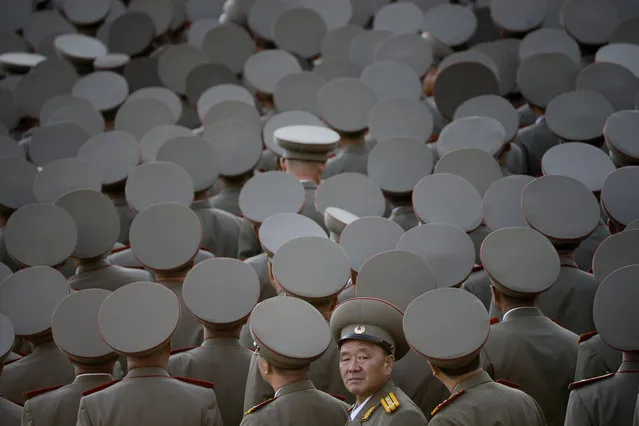 North Korean veterans gather before the start of a parade in Pyongyang, North Korea, Saturday, October 10, 2015. (Photo by Wong Maye-E/AP Photo)