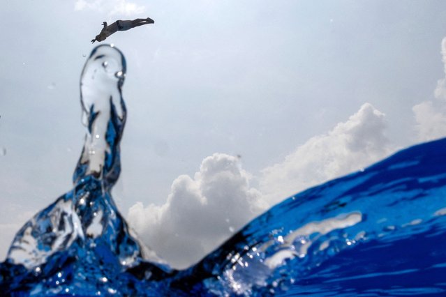 Jean-David Duval of Team Switzerland competes in the Men’s 27m Platform High Diving Rounds 3-4 on day 15 of the Singapore 2025 World Aquatics Championships at The Palawan @ Sentosa on July 25, 2025 in Singapore. (Photo by Marko Djurica/Reuters)