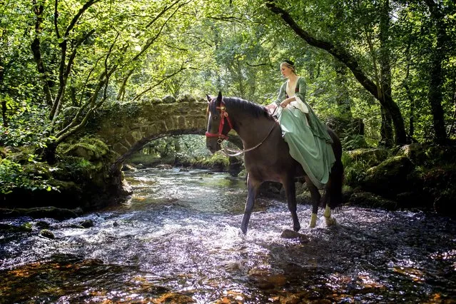 Sarah Kate Byrne, a stylist, wore a side saddle gown from the Royal Opera House for this fashion portrait at the River Bovey in Hisley Wood on Dartmoor, UK in September 2020. (Photo by Hazel Mansell Greenwood/The Times)