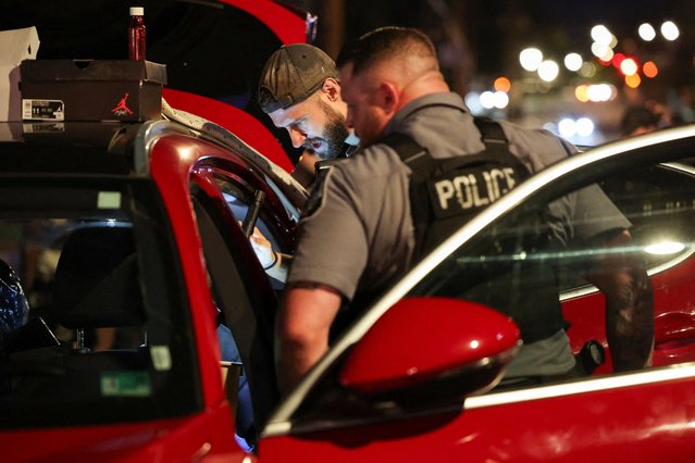 U.S. President Trump deploys the National Guard and federalizes the Metropolitan Police Department in Washington on August 13, 2025. (Photo by Jessica Koscielniak/Reuters)