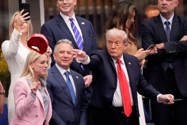 U.S. President Donald Trump throws a hat after Spain's Carlos Alcaraz won the men's singles final in Flushing Meadows, New York, United States on September 7, 2025. (Photo by Eduardo Munoz/Reuters)