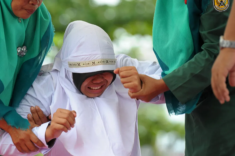 Whipping Punishment in Indonesia