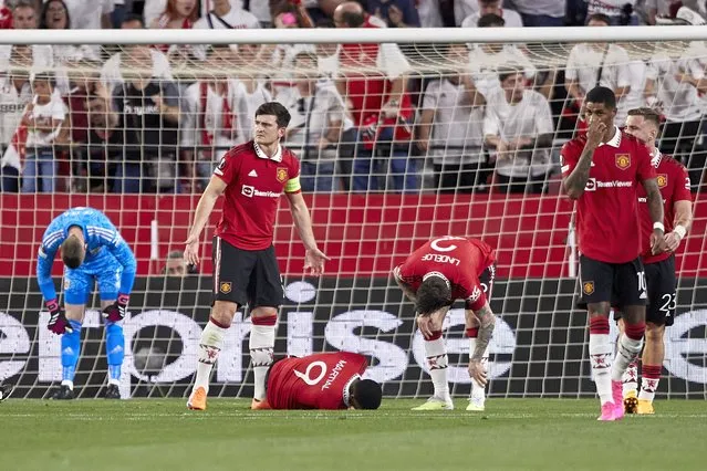 Players of Manchester United react after Loic Bade of Sevilla FC goal during the UEFA Europa League quarterfinal second leg match between Sevilla FC and Manchester United at Estadio Ramon Sanchez Pizjuan on April 20, 2023 in Seville, Spain. (Photo by Fermin Rodriguez/Quality Sport Images/Getty Images)