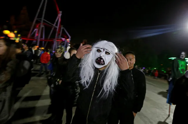 A man arrives to attend a Halloween parade at Happy Valley park in Beijing, China October 31, 2016. (Photo by Jason Lee/Reuters)