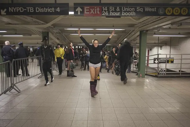 Participants take part in the “No Pants Subway Ride” in the Manhattan borough of New York January 11, 2015. (Photo by Carlo Allegri/Reuters)