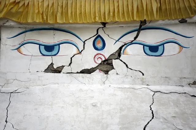 The cracked walls of a Buddhist shrine are seen after it was damaged during the earthquake earlier this year at Khumjung, a typical Sherpa village in Solukhumbu District also known as the Everest region, in this picture taken November 30, 2015. (Photo by Navesh Chitrakar/Reuters)