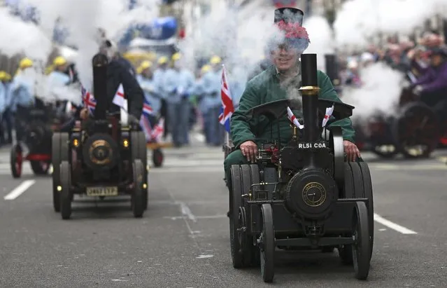 Miniature steam engine enthusiasts take part in the  New Year's Day Parade in London, Britain January 1, 2016. (Photo by Neil Hall/Reuters)