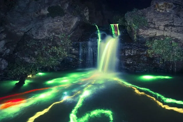 “Neon Luminance” glowstick waterfall photography, California, America. (Photo by Sean Lenz/Kristoffer Abildgaard)