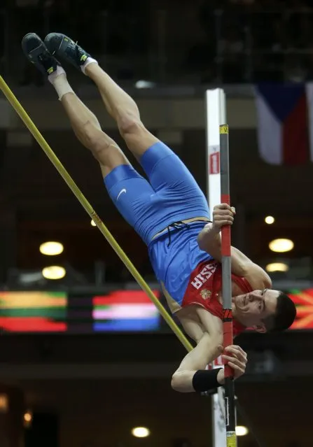 Ilya Shkurenyov of Russia competes in the men's heptathlon pole vault event during the European Indoor Championships in Prague March 8, 2015. REUTERS/David W Cerny (CZECH REPUBLIC  - Tags: SPORT ATHLETICS)  