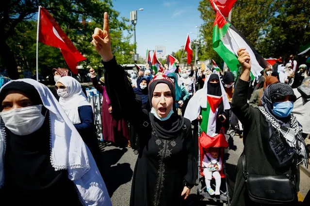 Women shout slogans to express solidarity with Palestinian people during a protest against Israel in Ankara, Turkey on May 15, 2021. (Photo by Cagla Gurdogan/Reuters)