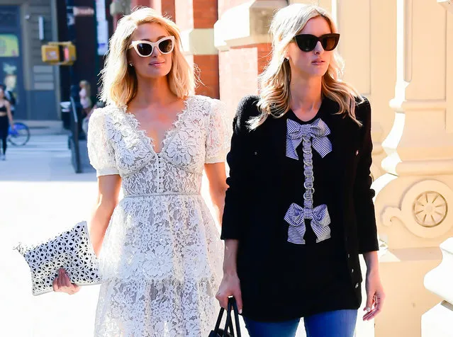 Paris Hilton and Nicky Hilton Rothschild are seen in SoHo on June 21, 2021 in New York City. (Photo by Raymond Hall/GC Images)