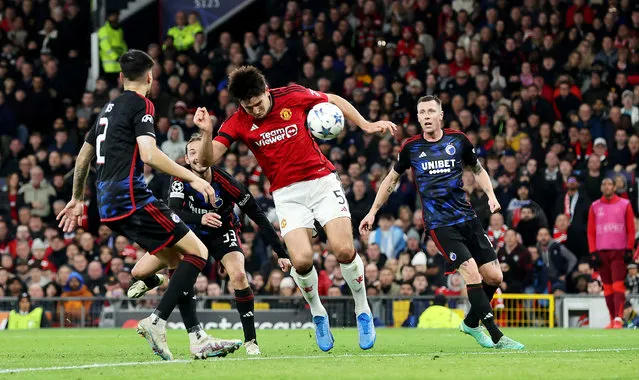Harry Maguire of Manchester United scores the team's first goal during the UEFA Champions League match between Manchester United and F.C. Copenhagen at Old Trafford on October 24, 2023 in Manchester, England. (Photo by Jan Kruger/Getty Images)