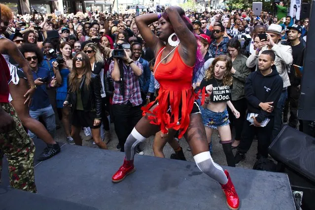 People take part in “TWERKERS”, an event organised to break the Guinness World Record for largest number of people to perform a dance known as “twerking”, in New York, September 25, 2013. (Photo by Eduardo Munoz/Reuters)