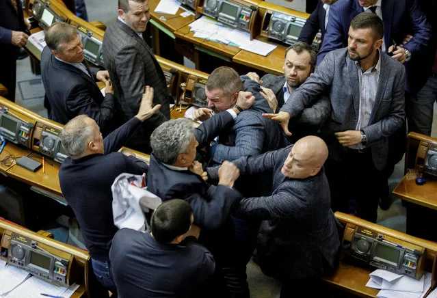 Deputies clash during a session of the parliament in Kiev, Ukraine on December 20, 2018. (Photo by Alex Kuzmin/Reuters)