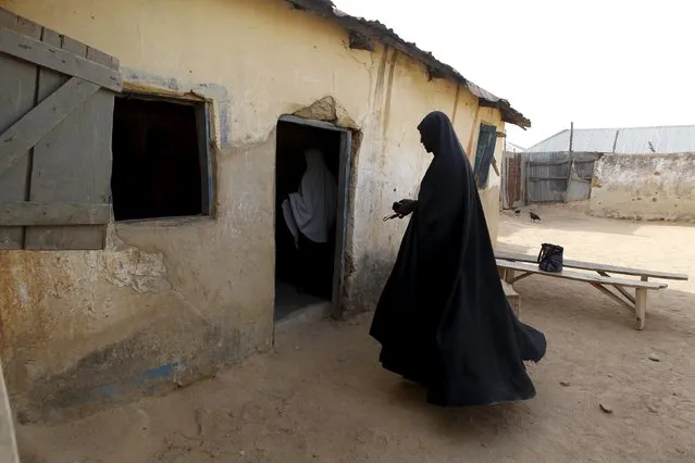 A Shi'ite woman is seen going into a classroom at a local Islamic school in Zaria, Kaduna state, Nigeria, February 2, 2016. (Photo by Afolabi Sotunde/Reuters)
