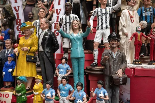 A Neapolitan nativity scene statue depicting the leader of the centre-right party “Fratelli D'Italia” (Brothers of Italy), Giorgia Meloni, made by the “Di Virgilio” studio of artists and master nativity scene makers, in San Gregorio Armeno, Naples, Southern Italy, on September 6, 2022. The studio of artists and master nativity scene makers “Di Virgilio”, in San Gregorio Armeno, after Giorgia Meloni's party won the 2022 Italian parliamentary elections, loyalised one of its nativity scene statues to congratulate the victory, thus becoming part of the typical Neapolitan nativity scene. (Photo by Stringer/Anadolu Agency via Getty Images)
