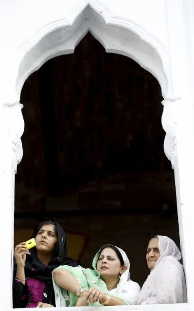 Sikh devotees watch the Baisakhi festival at Panja Sahib shrine in Hassan Abdel April 13, 2015. (Photo by Caren Firouz/Reuters)