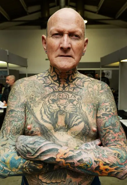Colin Snow, 70, shows off his tattoos at the 2017 Tattoo Collective event at the Old Truman Brewery in London, England on February 17, 2017. (Photo by PA Wire)