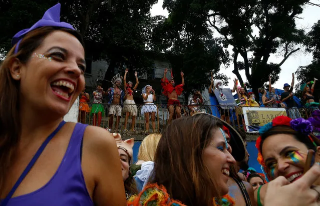 Revellers take part in an annual block party known as “Ceu na Terra” (Heaven on Earth), one of the many carnival parties to take place in the neighbourhoods of Rio de Janeiro, Brazil February 25, 2017. (Photo by Ricardo Moraes/Reuters)