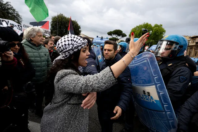 Pro-Palestine demonstrators face off with police during the commemoration of the 79th Liberation Day, in Rome, Italy, 25 April 2024. Liberation Day (Festa della Liberazione) is a nationwide public holiday in Italy that is annually celebrated on 25 April. The day remembers Italians who fought against the Nazis and Mussolini's troops during World War II and honors those who served in the Italian Resistance. (Photo by Massimo Percossi/EPA/EFE)