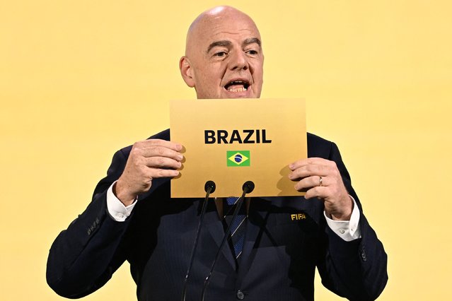 FIFA President Gianni Infantino announces Brazil as the hosts of the 2027 Women's World Cup during the 74th FIFA Congress in Bangkok on May 17, 2024. The 74th FIFA Congress is taking place in Bangkok with member associations voting on a range of issues including confirmation of the host nation or nations for the 2027 women's football World Cup. (Photo by Manan Vatsyayana/AFP Photo)