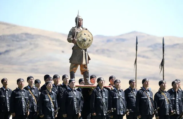 Kazakh servicemen perform during a ceremony opening the International Army Games at the 40th military base Otar in Zhambyl Region, Kazakhstan on August 7, 2019. (Photo by Pavel Mikheyev/Reuters)