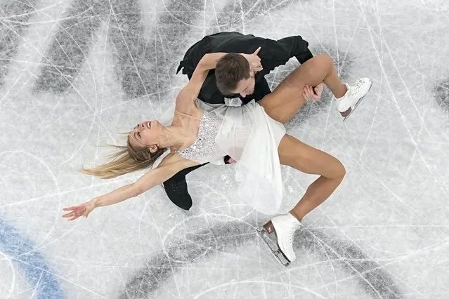 Victoria Sinitsina and Nikita Katsalapov, of the Russian Olympic Committee, compete in the team ice dance program during the figure skating competition at the 2022 Winter Olympics, Monday, Feb. 7, 2022, in Beijing. (Photo by Jeff Roberson/AP Photo)