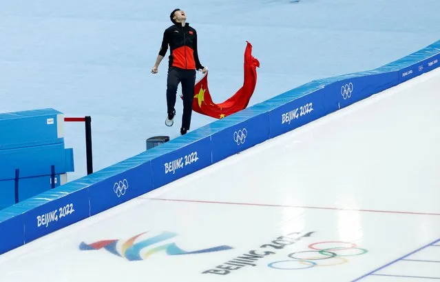 Gao Tingyu of Team China celebrates winning the gold medal during the Men's Speed Skating 500m on day eight of the Beijing 2022 Winter Olympic Games at National Speed Skating Oval on February 12, 2022 in Beijing, China. (Photo by Susana Vera/Reuters)